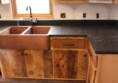 distressed wood kitchen cabinets and countertop